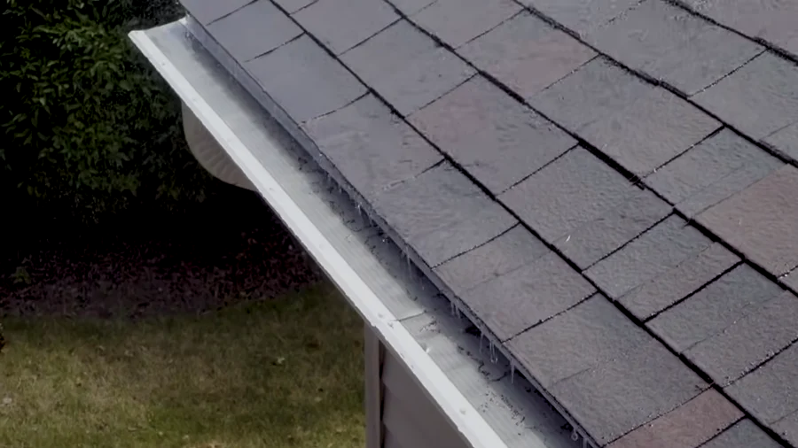 Close-up of a stainless micro-mesh gutter guard panel